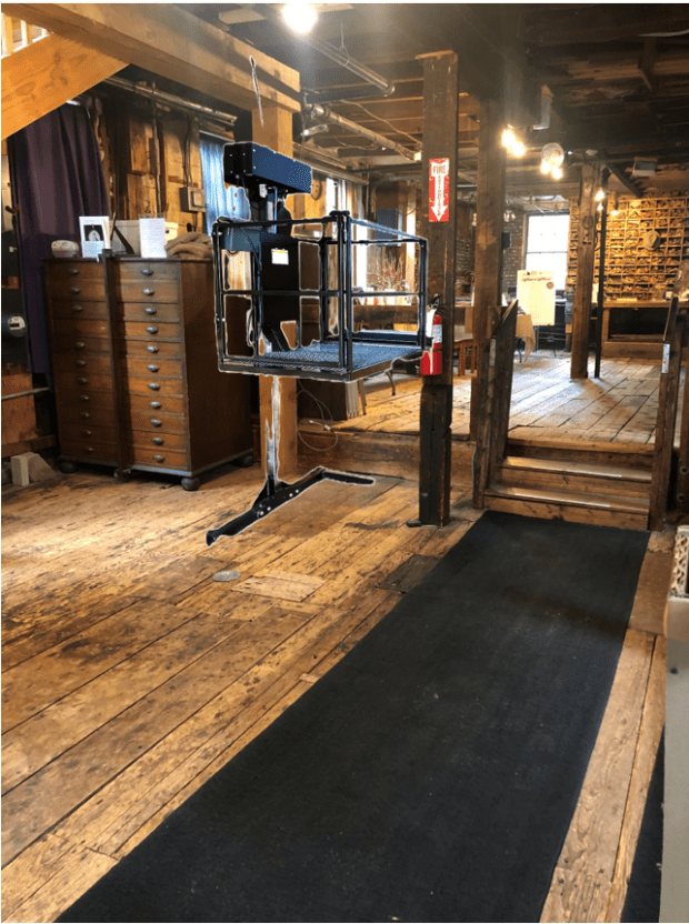mock up of mechanical lift in visitor area